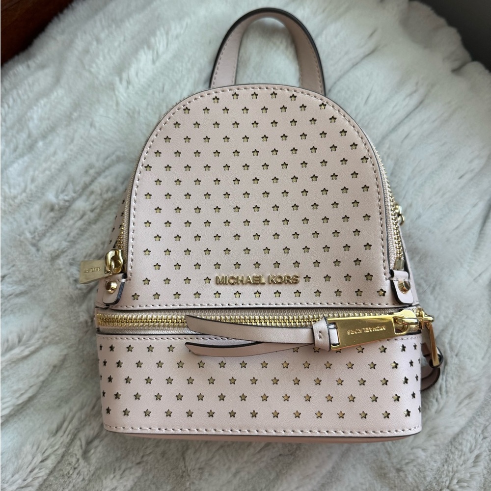 Michael Kors Pink Rhea Mini Perforated Leather Backpack